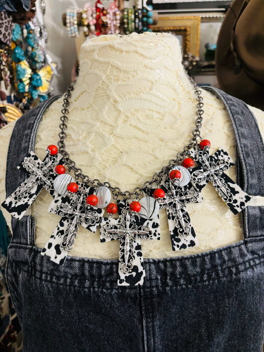 Cowprint cross necklace